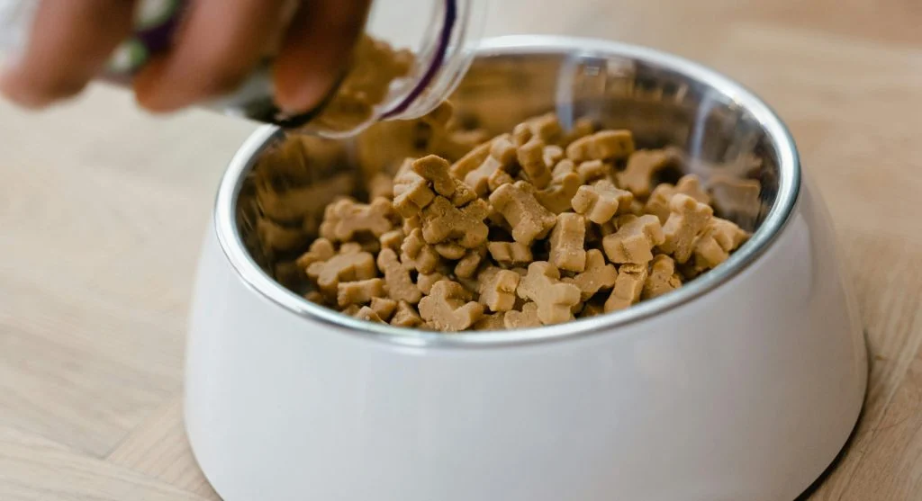 A chart or calendar showing the daily feeding schedule for pets